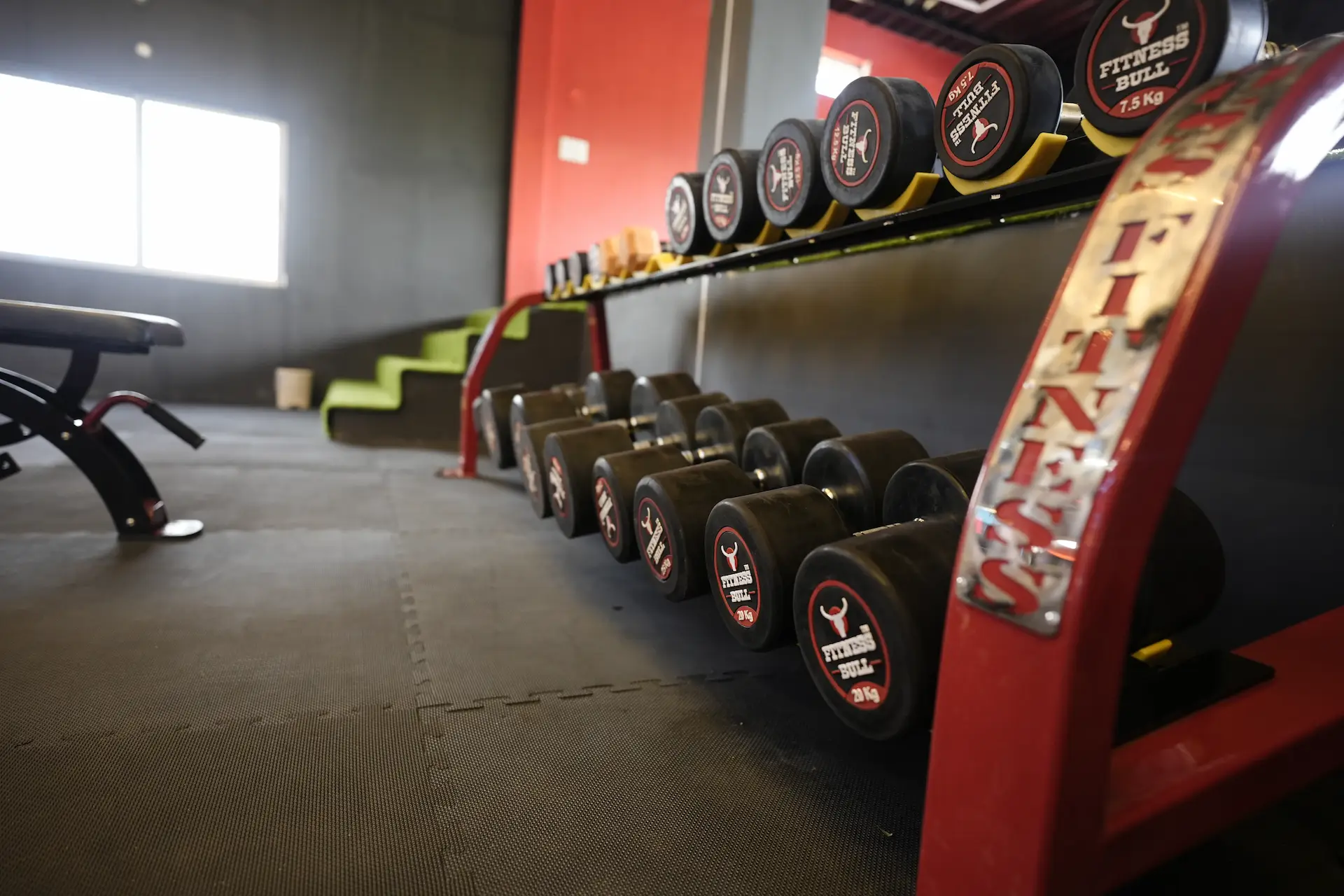 Close-up of the dumbbell rack at GPM Fitness