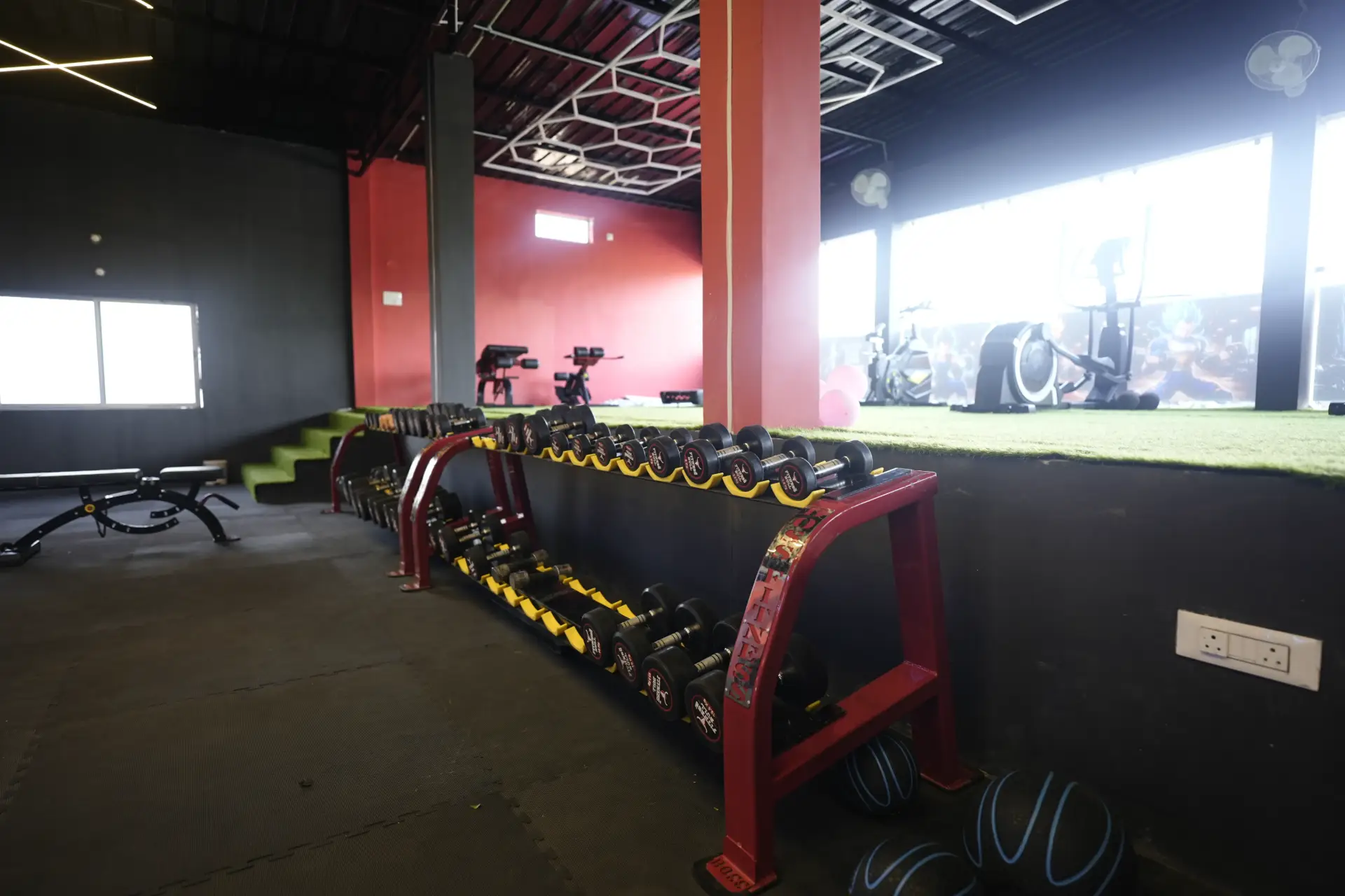 Dumbbell rack and cardio training zone at GPM Fitness Pendra Road