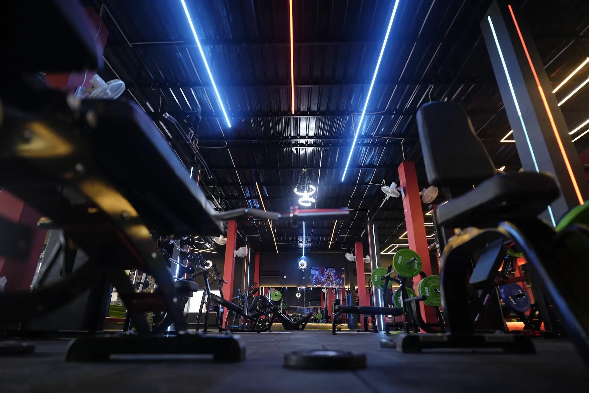 Low angle view of the strength floor and LED ceiling lights at GPM Fitness